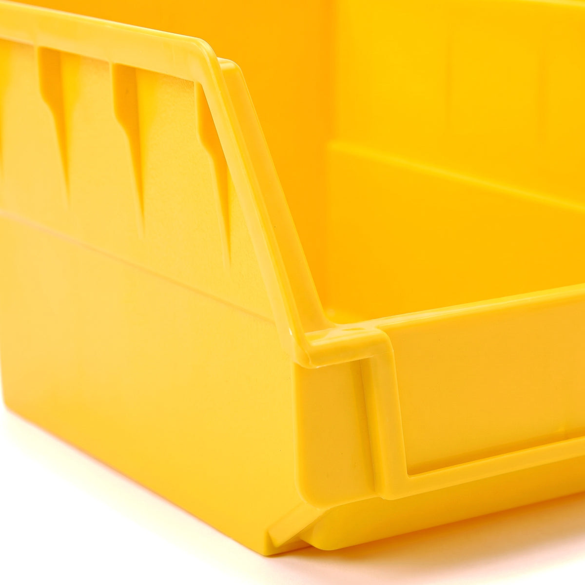Small yellow hook-on bin - close-up of moulding