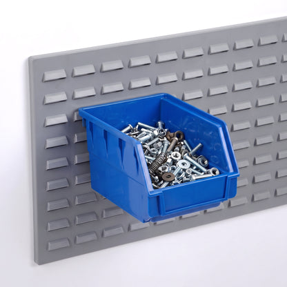 Small blue hook-on bin on a louvre panel filled with fixings